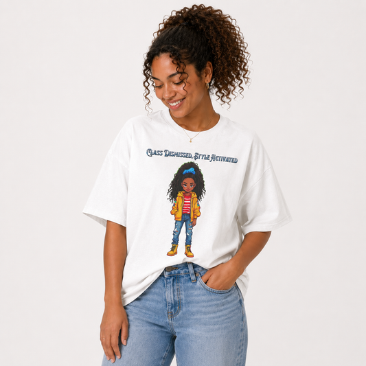 A woman wearing a white graphic t-shirt with a cartoon illustration of a girl and the text 'Class Disabled, Stay Activated', paired with light wash blue jeans, against a plain white background.