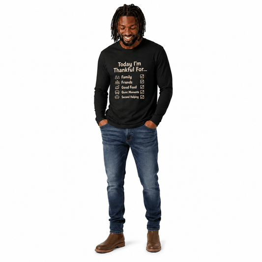 A man with a black shirt that states Thankful For Thanksgiving long sleeve tee with gratitude checklist design with a white background.