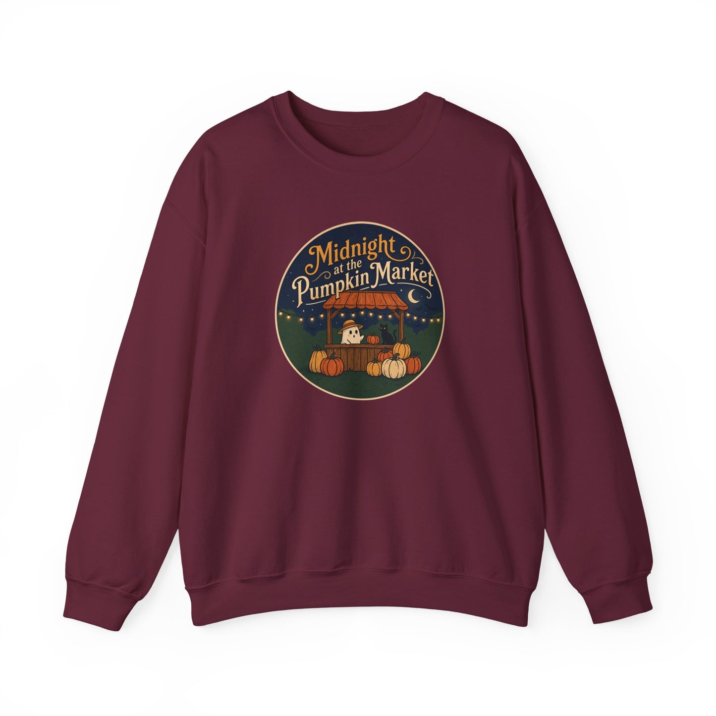 Maroon graphic sweatshirt featuring a 'Midnight Pumpkin Market' design, layered under an olive green jacket. She is standing against a solid white background.