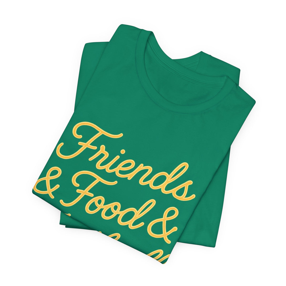 A folded green t-shirt with yellow cursive text reading 'Friends & Food' on a plain white background.