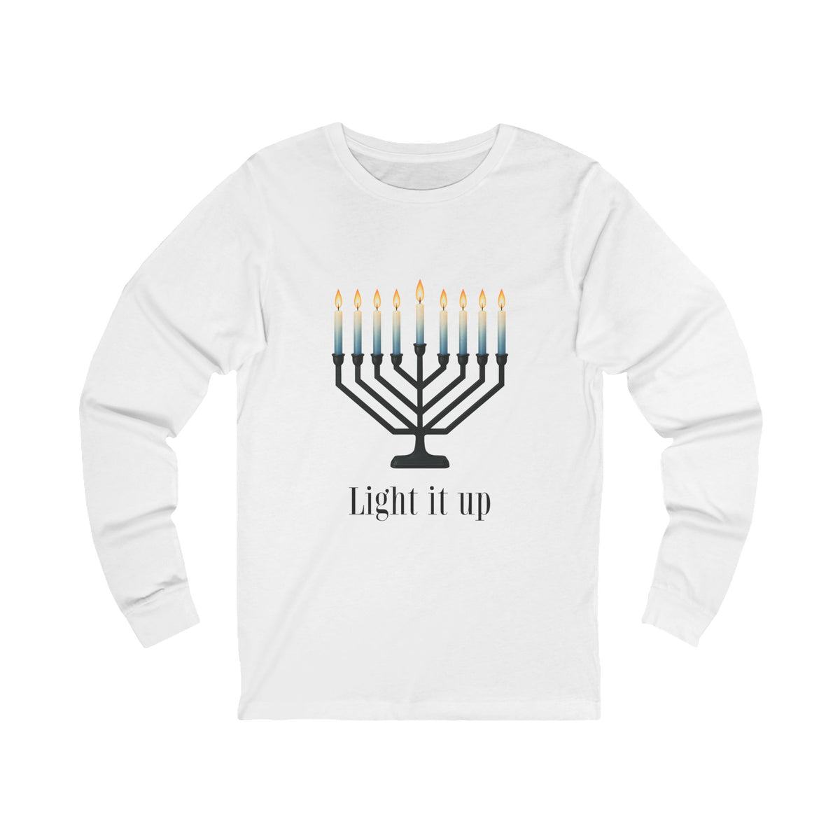A white long-sleeve t-shirt with a graphic of a black menorah with blue-to-yellow lit candles and the text 'Light it up' printed below, displayed on a clean white background.