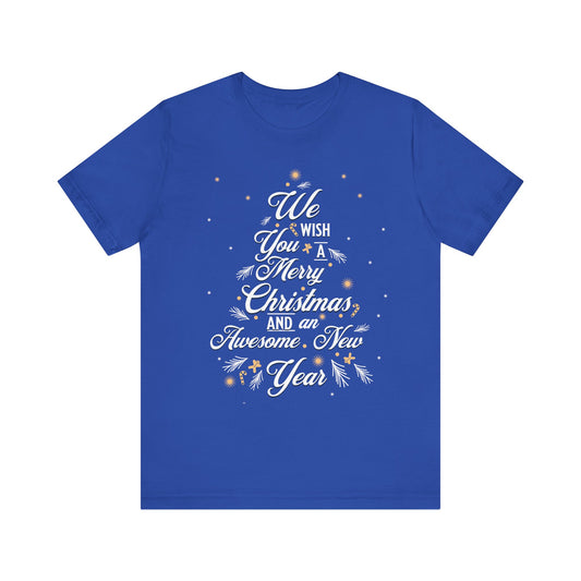 A royal blue short-sleeve crewneck t-shirt with a festive graphic on the front. The design features the text 'We Wish You A Merry Christmas, and an Awesome New Year' in white script, decorated with white pine branches and small glowing gold stars.