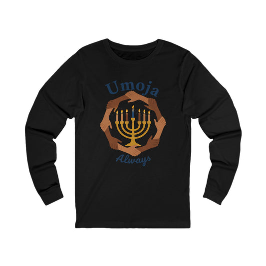 A black long-sleeve t-shirt with a graphic print of a golden menorah surrounded by diverse hands, with the text 'Umoja Always' in blue script.