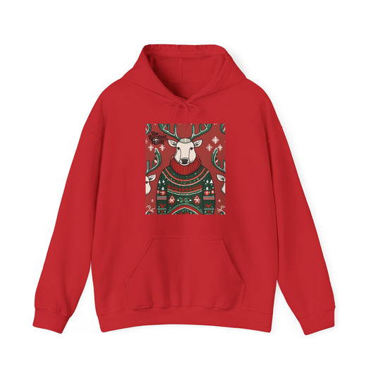 A red pullover hoodie featuring a festive graphic of a reindeer wearing a patterned Christmas sweater on the chest, displayed against a solid white background.