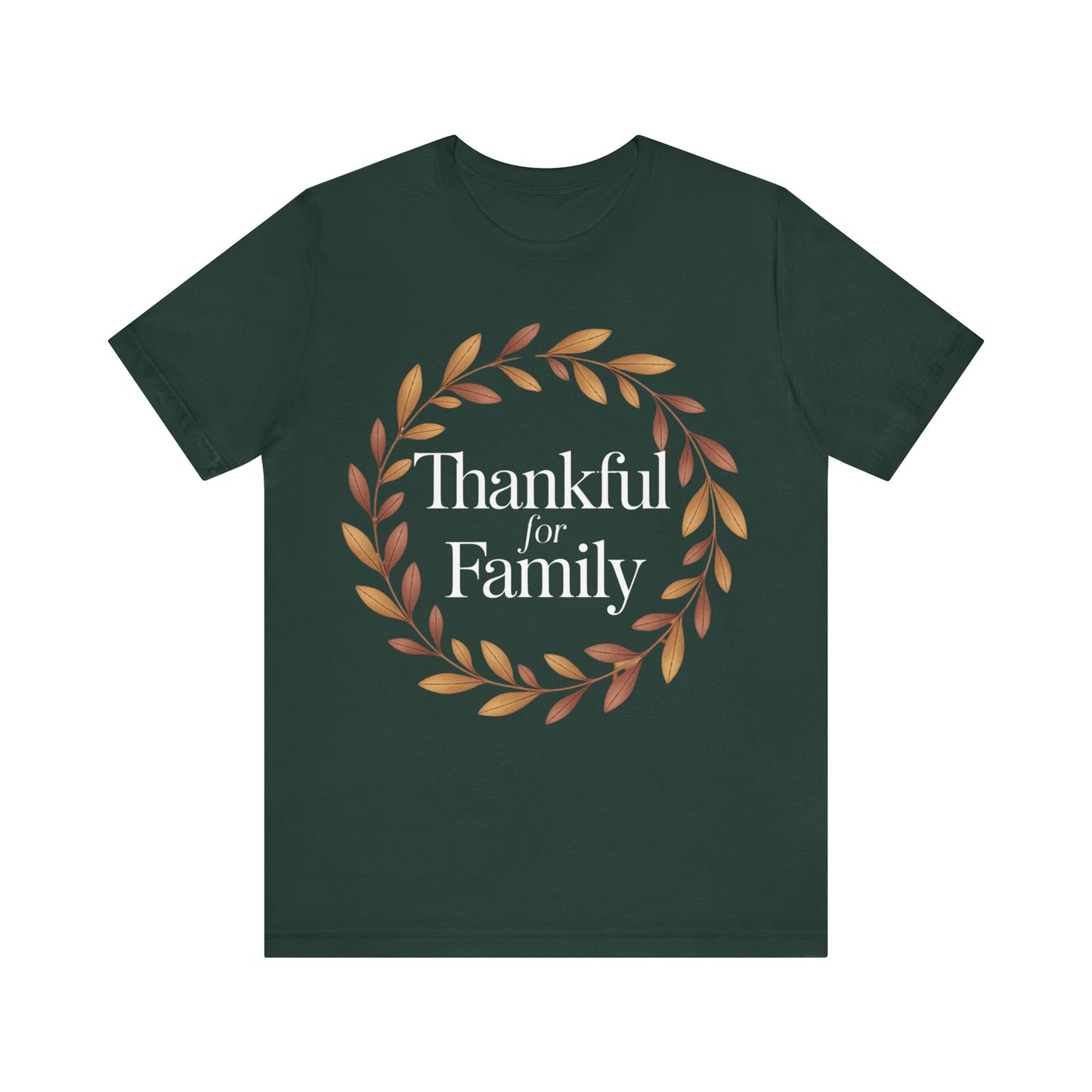 A dark forest green short-sleeve t-shirt with a graphic on the chest featuring a circular wreath of brown and orange leaves surrounding the white serif text 'Thankful for Family'.