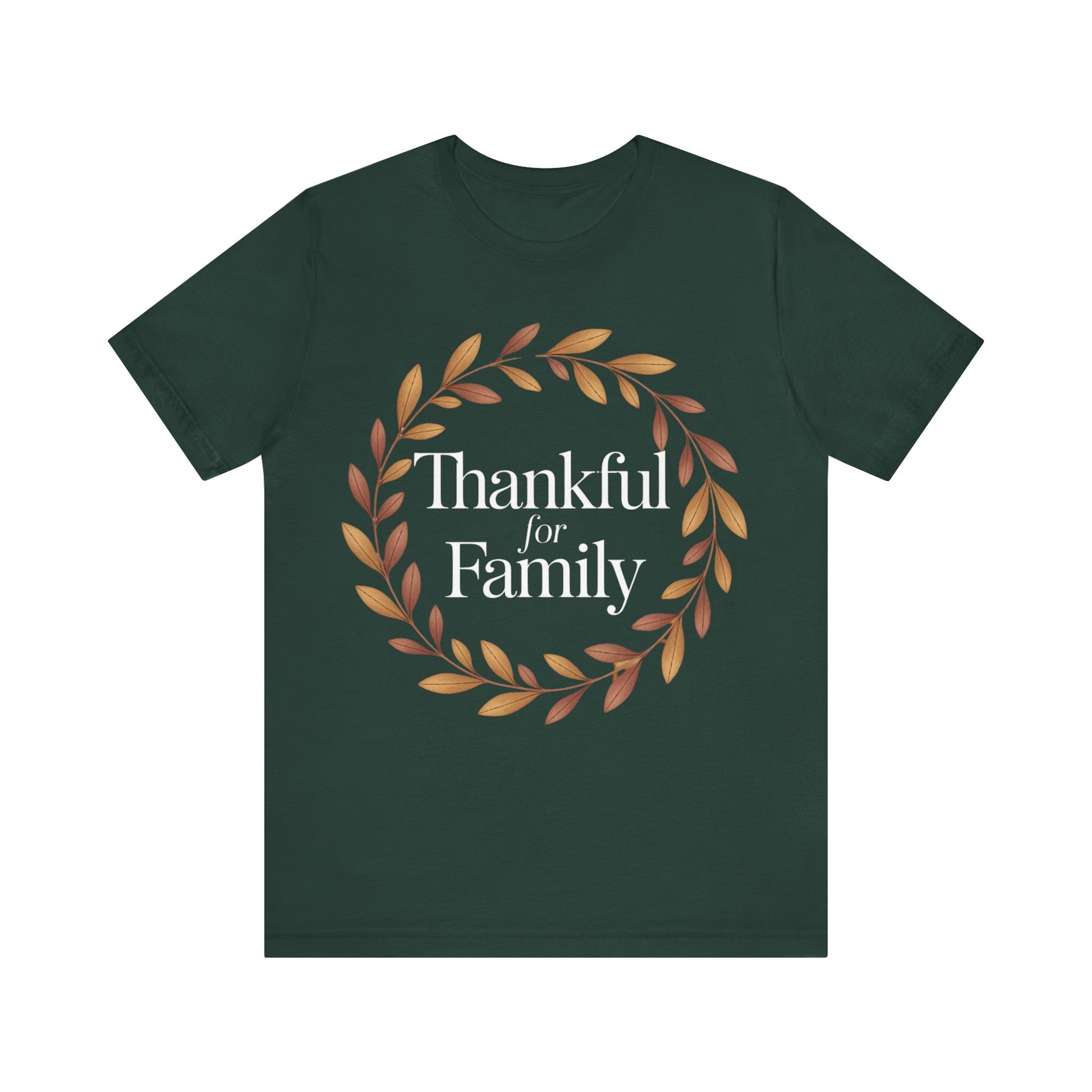 A dark forest green short-sleeve t-shirt with a graphic on the chest featuring a circular wreath of brown and orange leaves surrounding the white serif text 'Thankful for Family'.