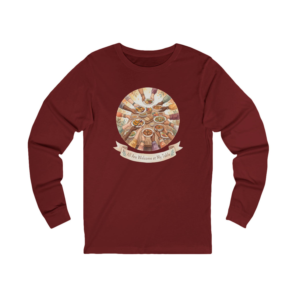 A long-sleeve crewneck t-shirt in maroon, featuring a circular graphic on the chest depicting hands holding a Passover Seder plate with various foods, and a banner below that reads 'No One Feels Welcome in My Table!'.