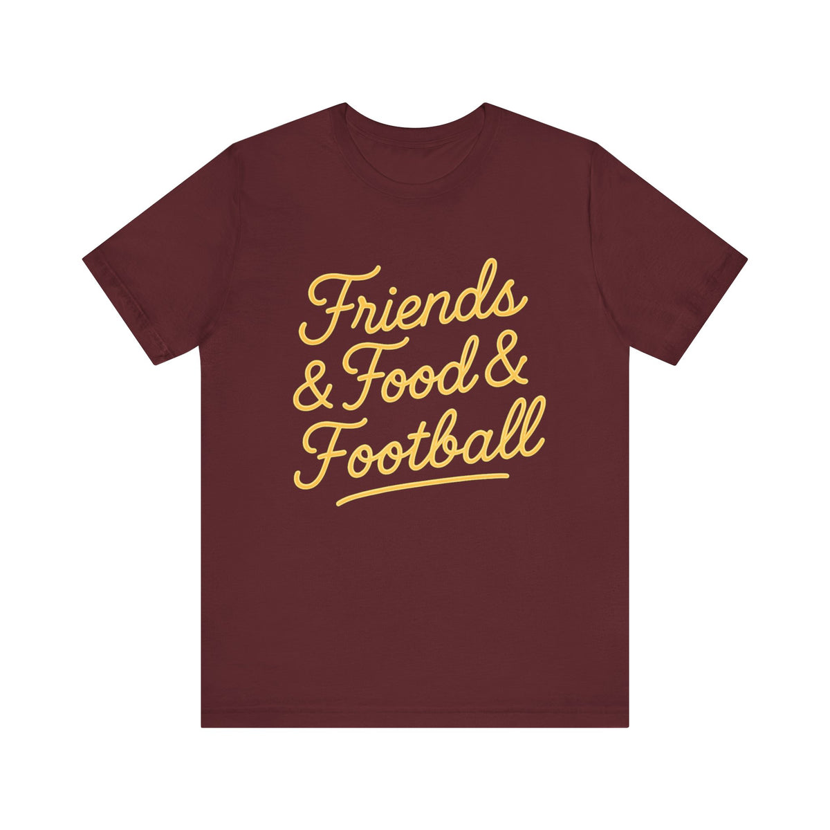 A maroon short-sleeve crewneck t-shirt with 'Friends & Food & Football' printed in yellow cursive text across the chest, displayed on a solid white background.