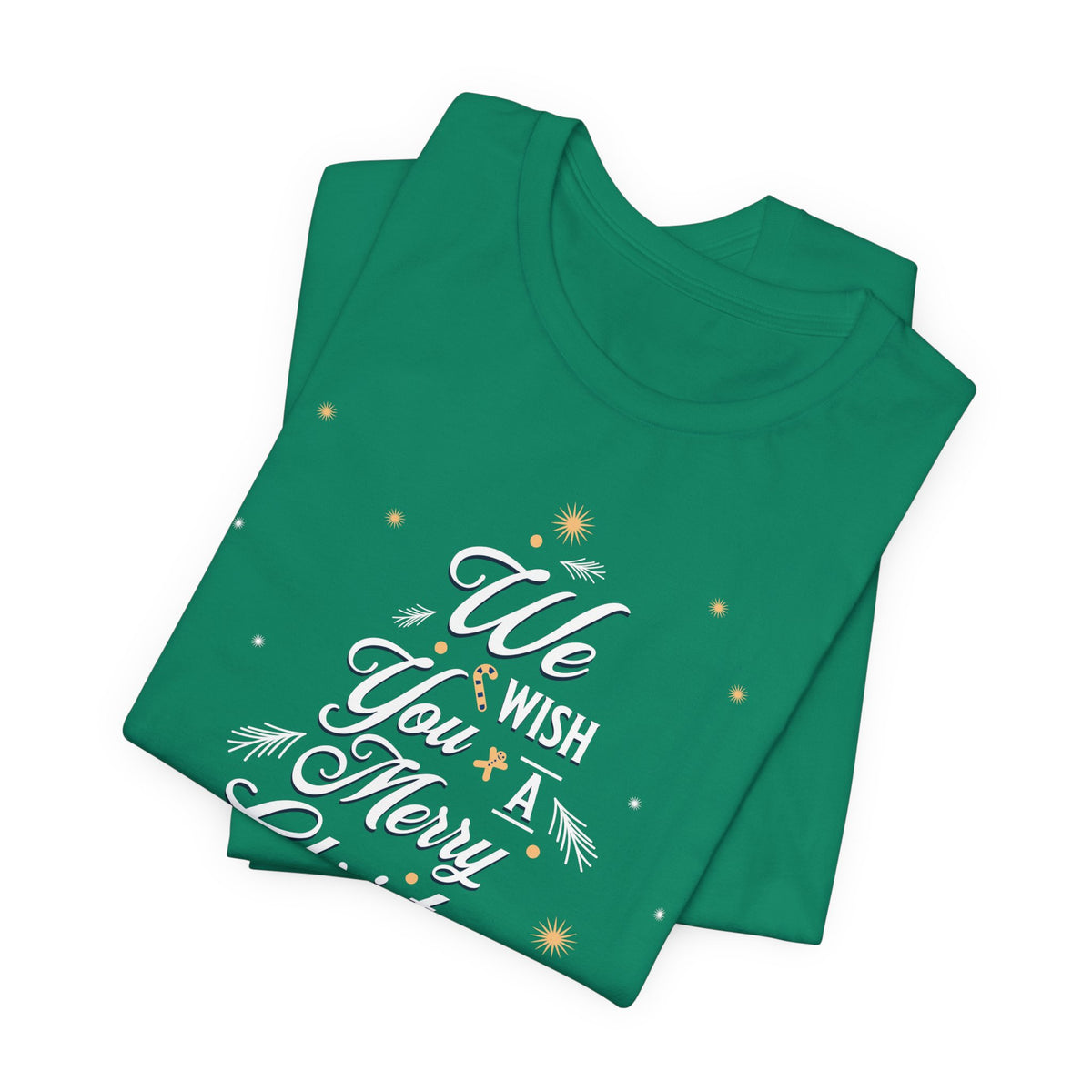 A folded green t-shirt with a festive white and gold graphic that reads 'We Wish You A Merry Day!' decorated with stars and pine needles, set against a plain white background.
