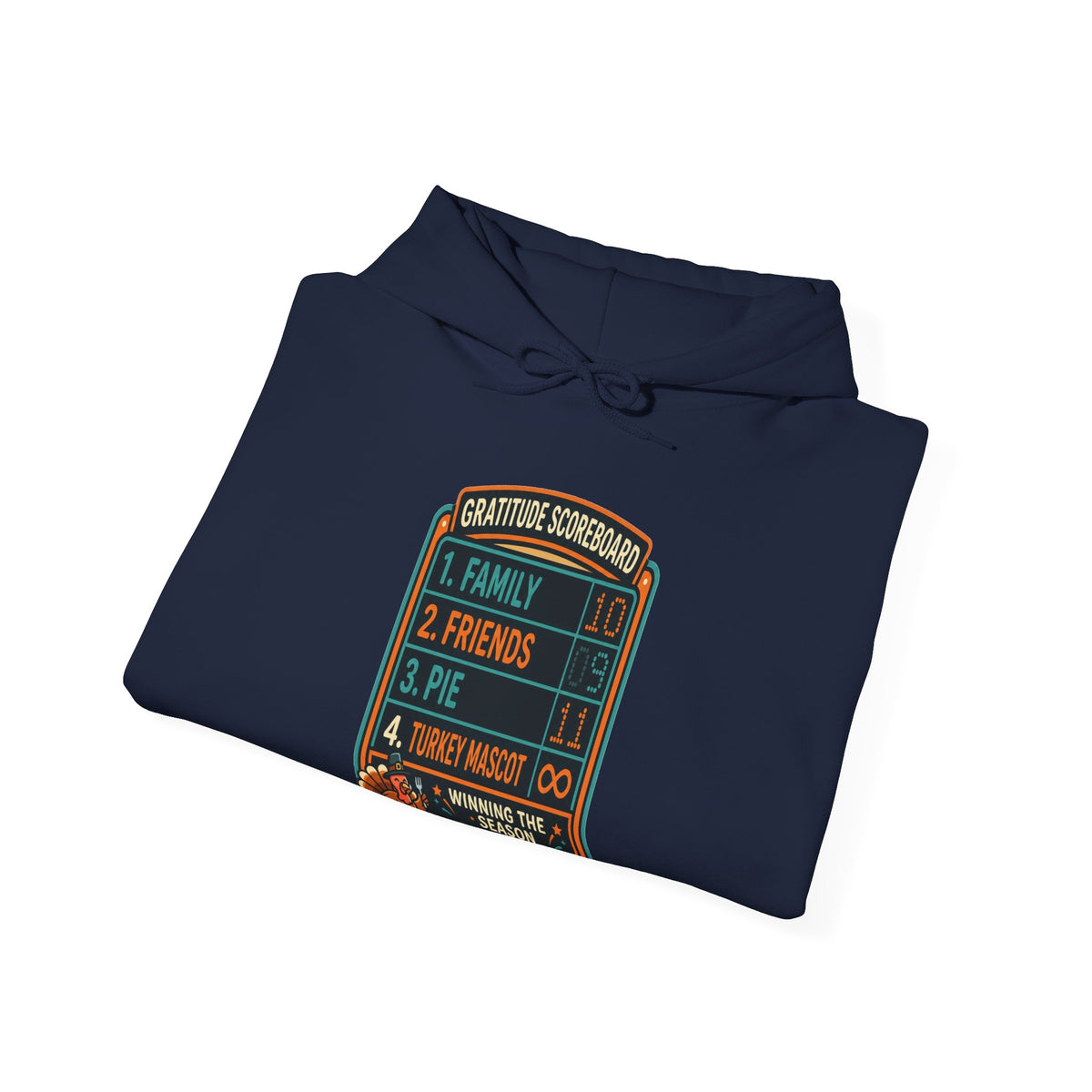 Gratitude Scoreboard Thanksgiving football hoodie in navy folded with turkey game-day graphic with white background.