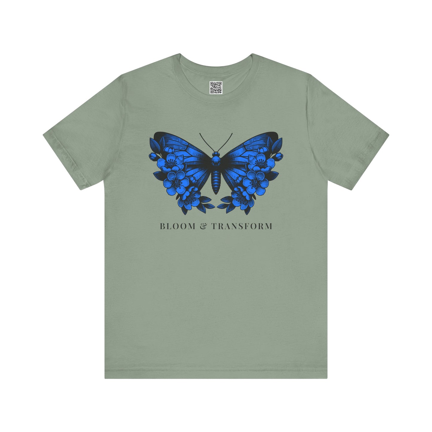 Sage t-shirt with a blue butterfly graphic and 'Bloom & Transform' text on a white background