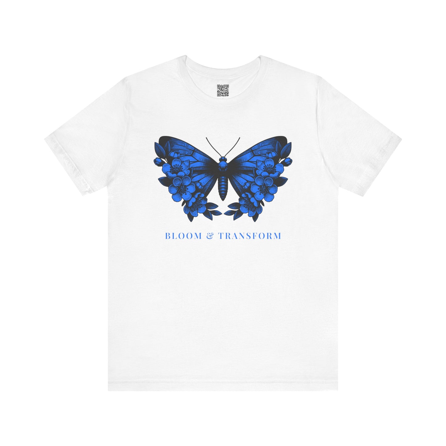 White t-shirt with a blue butterfly graphic and 'Bloom & Transform' text on a white background
