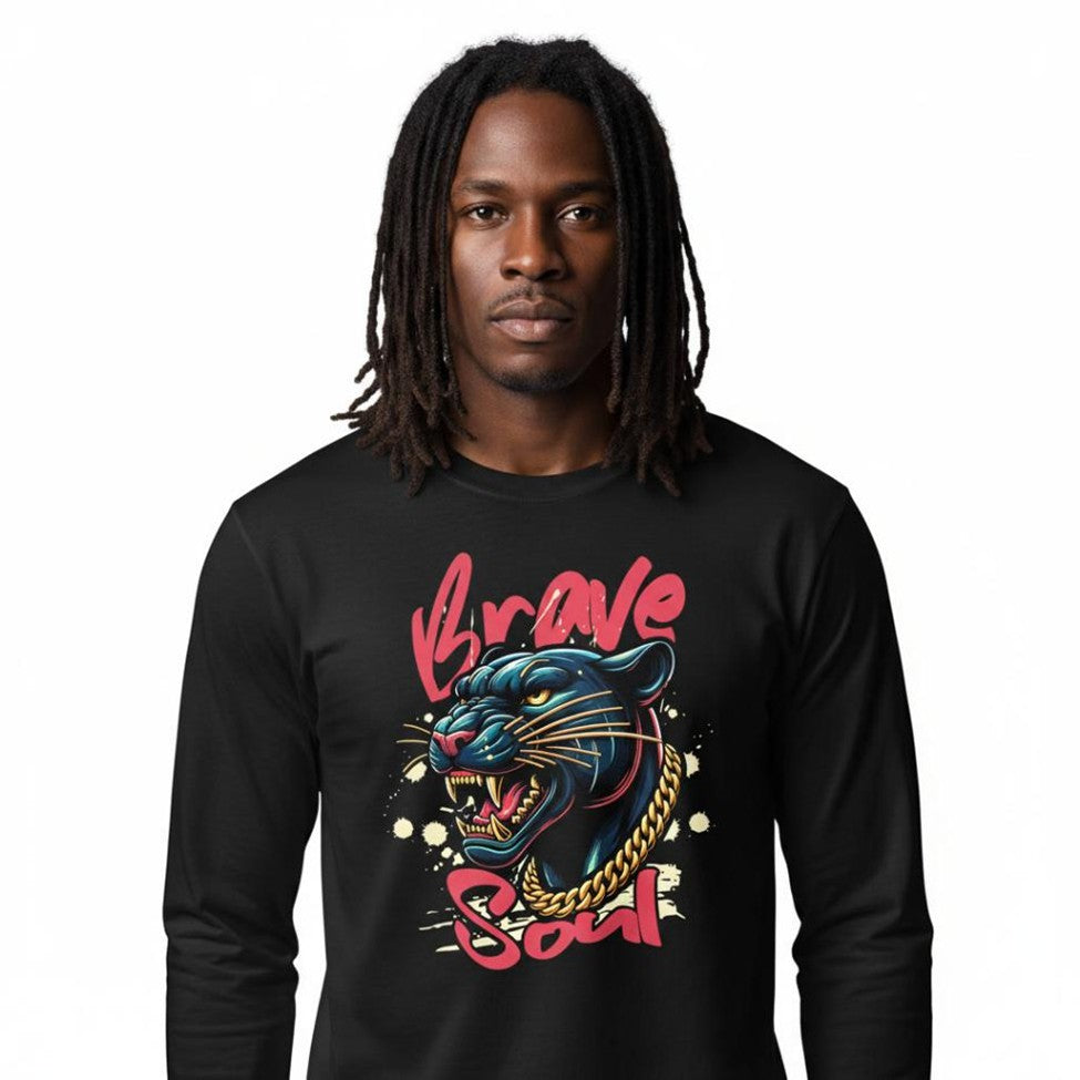 Person wearing a black long-sleeve shirt with a colorful panther graphic and text.