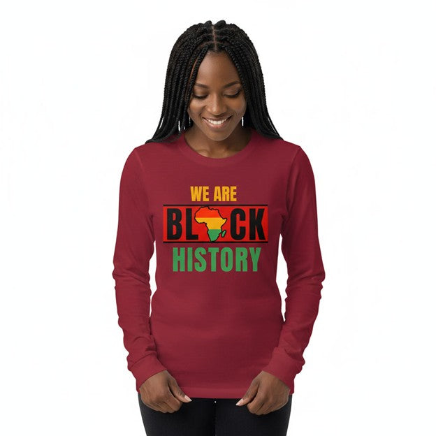 Woman wearing a red long-sleeve shirt with 'We Are Black History' text and African flag design.