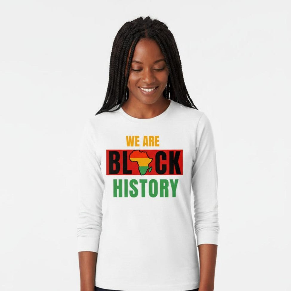 Person wearing a white long-sleeve shirt with 'We Are Black History' text and African flag design.