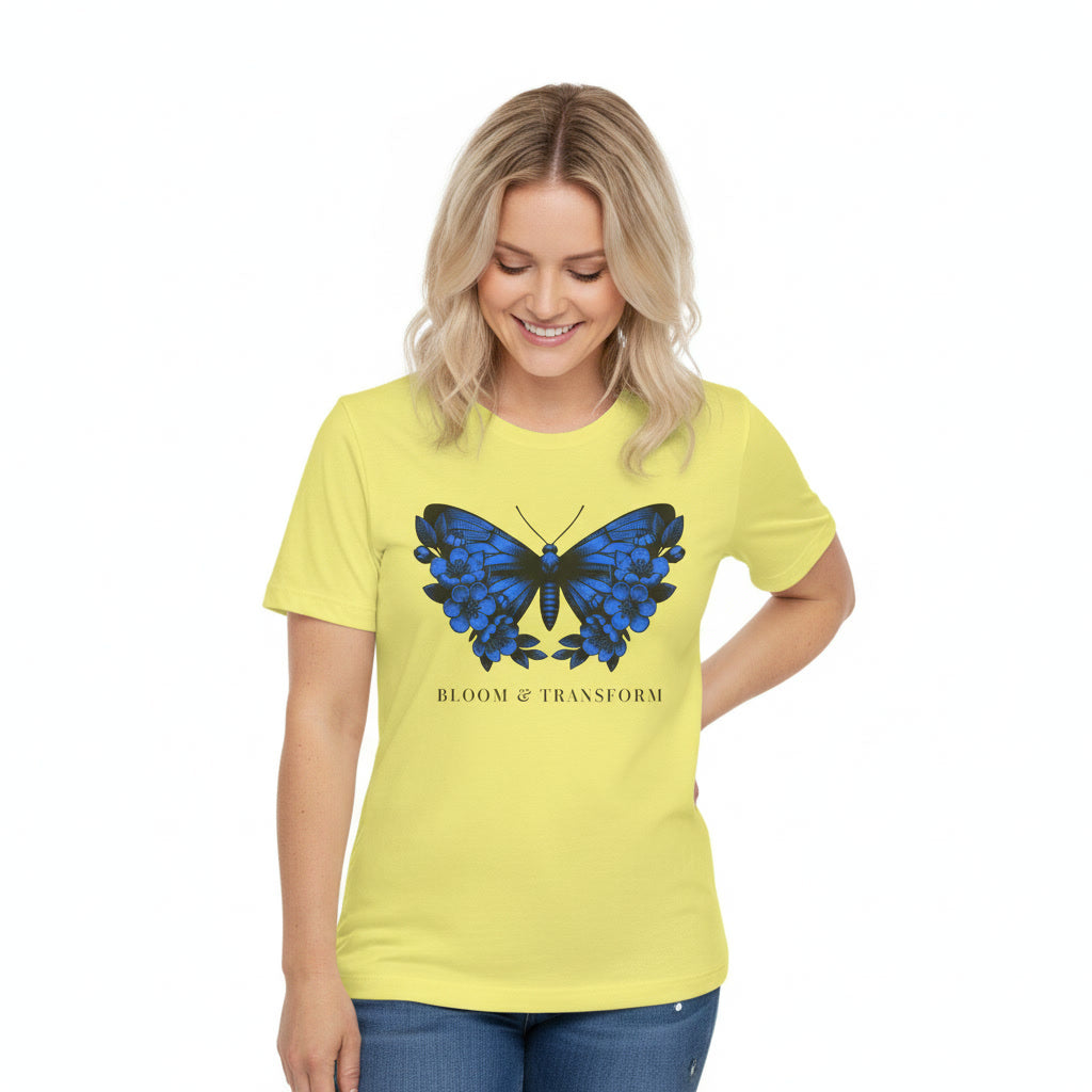 Woman wearing a yellow t-shirt with a blue butterfly design on a white background