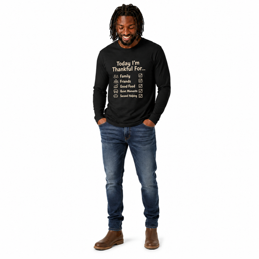 A man with a black shirt that states Thankful For Thanksgiving long sleeve tee with gratitude checklist design with a white background.