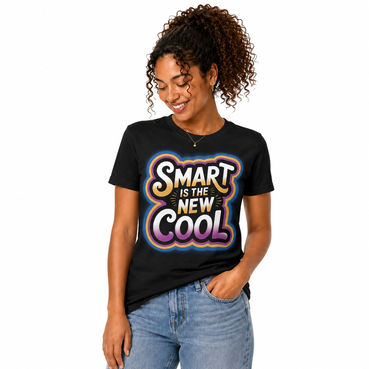 A woman wearing a black graphic t-shirt with the text 'SMART IS THE NEW COOL' in a colorful gradient bubble design, paired with light blue jeans, against a plain white background.