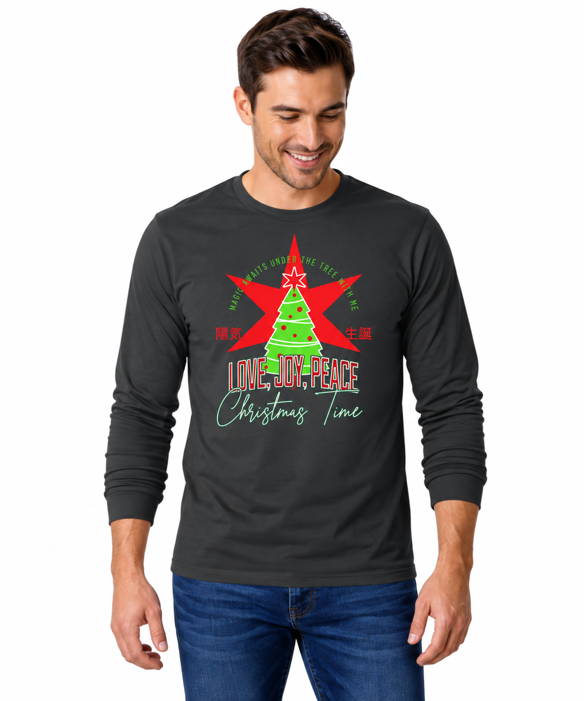 A male model with a dark gray long-sleeve t-shirt with a Christmas graphic on the chest, featuring a green tree, red star, and the text 'LOVE, JOY, PEACE Christmas Time' on a plain white background.