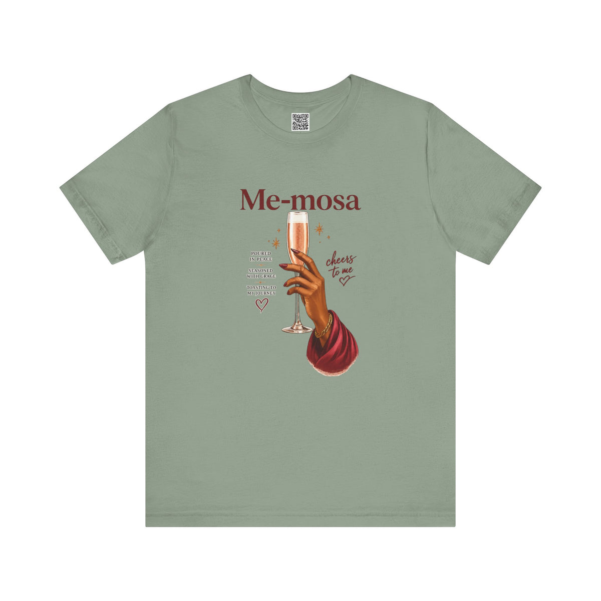 A sage green crewneck t-shirt featuring a graphic print of a hand holding a champagne flute with the text 'Me-mosa' and 'choose to me'.