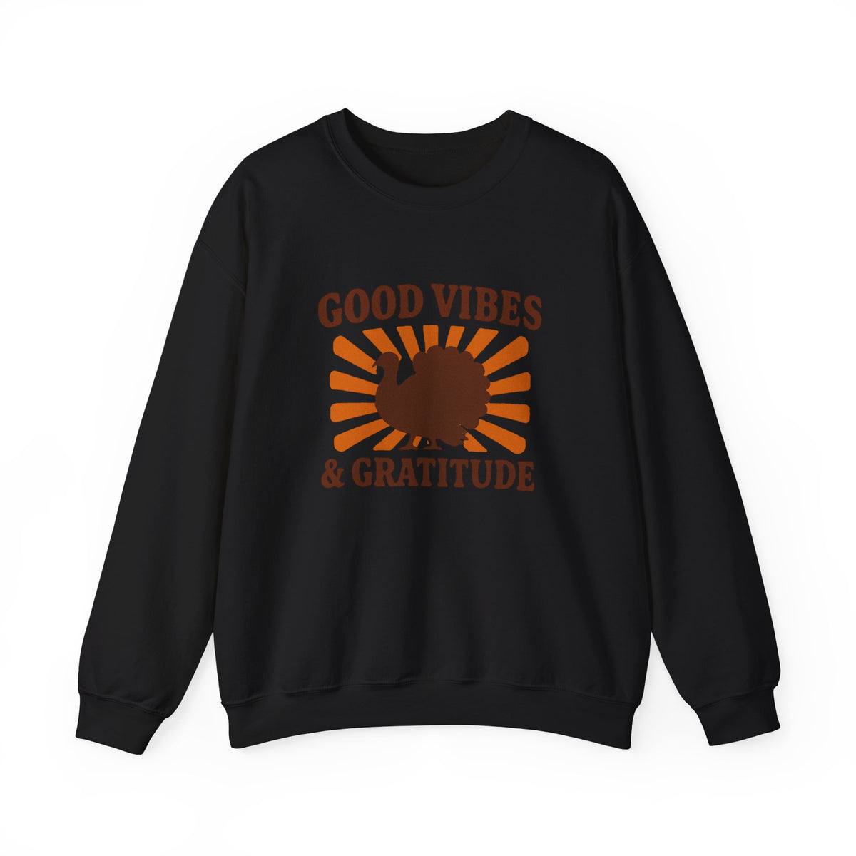 A black crewneck sweatshirt with a brown graphic on the chest featuring the text 'GOOD VIBES & GRATITUDE' and a turkey silhouette over an orange sunburst pattern, shown on a plain white background.