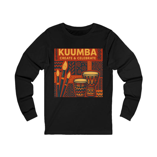 A black long-sleeve t-shirt with a square graphic on the chest featuring the text 'KUUMBA CREATE & CELEBRATE' above illustrations of patterned drums and paintbrushes in orange, red, and dark blue.