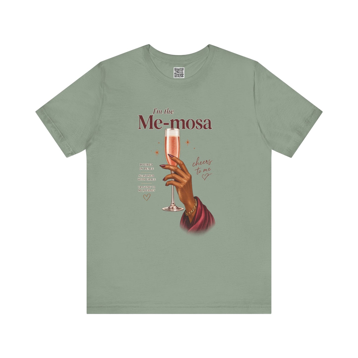 Green t-shirt with a graphic of a hand holding a glass of champagne and text on a white background