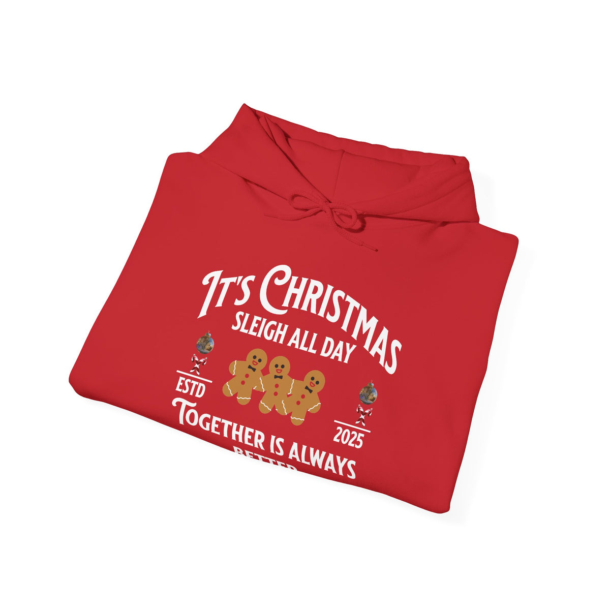 A folded red hoodie on a white background, featuring a festive Christmas graphic with gingerbread men and the text 'It's Christmas Sleigh All Day Together is Always Better'.
