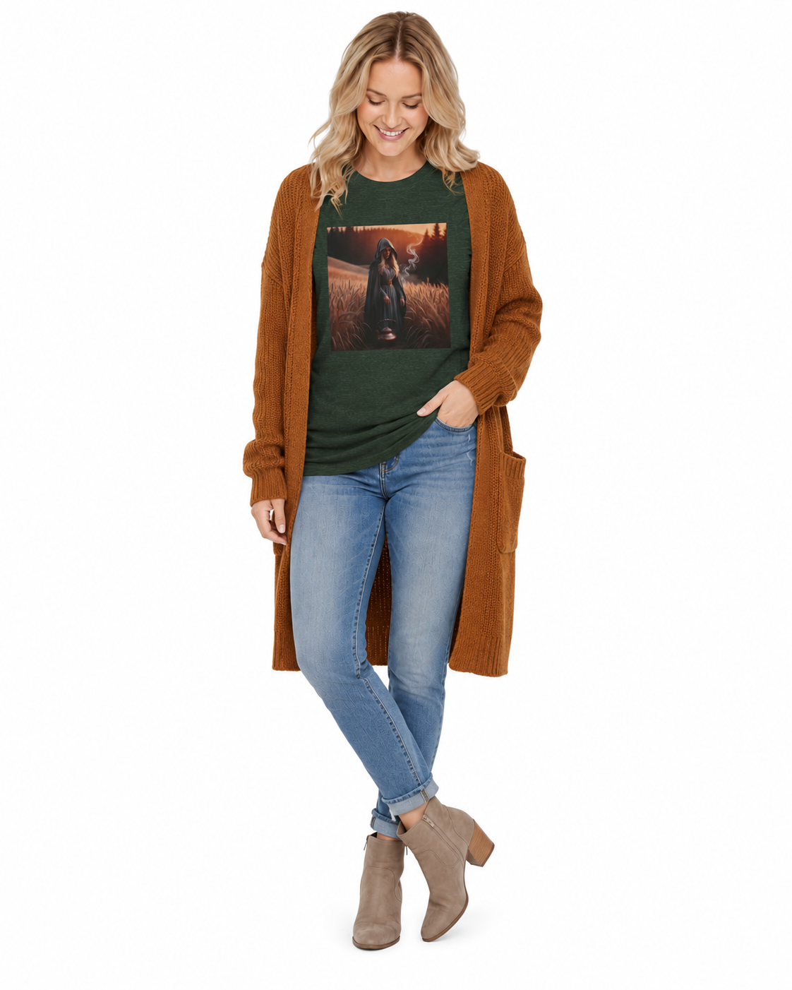 A woman modeling a long brown open-front cardigan over a dark green graphic t-shirt, paired with light blue jeans and taupe ankle boots, against a plain white background.