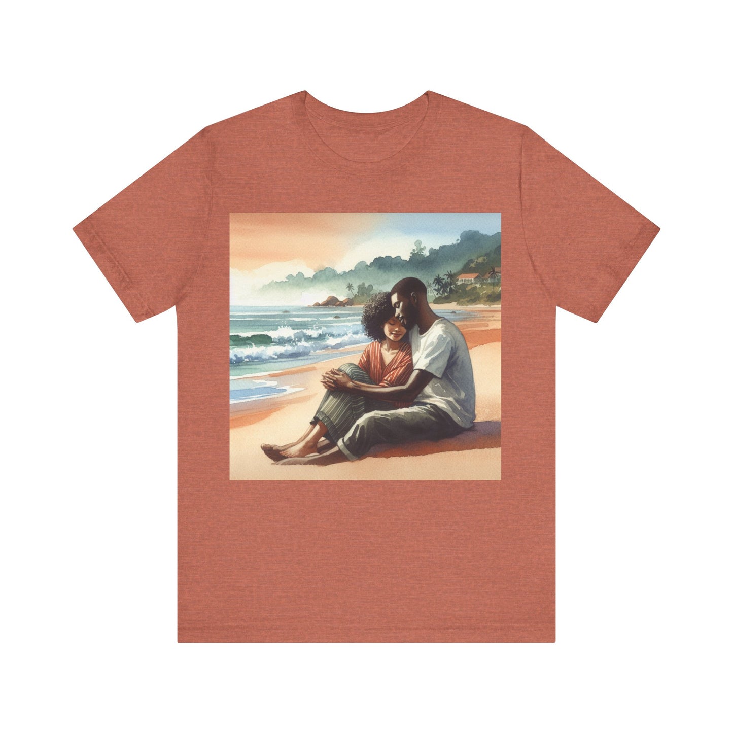 Heather clay t-shirt with a beach scene and two people sitting on the sand printed on it.
