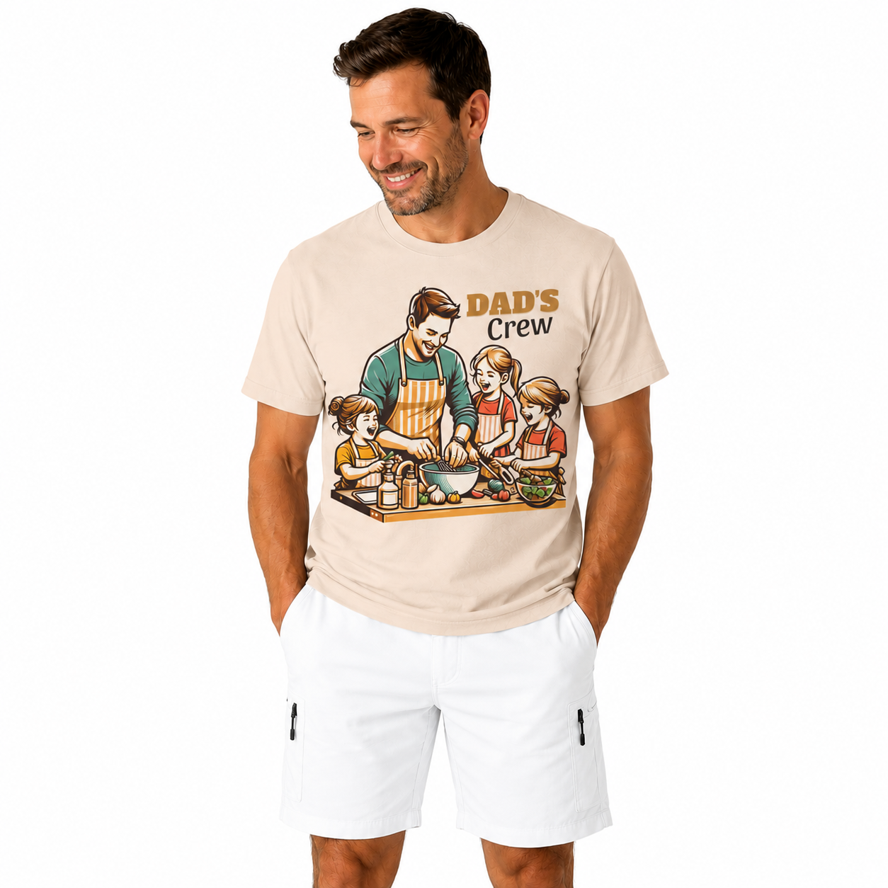 Man wearing a t-shirt with a graphic design of a father and children cooking, labeled 'Dad's Crew', on a white background.