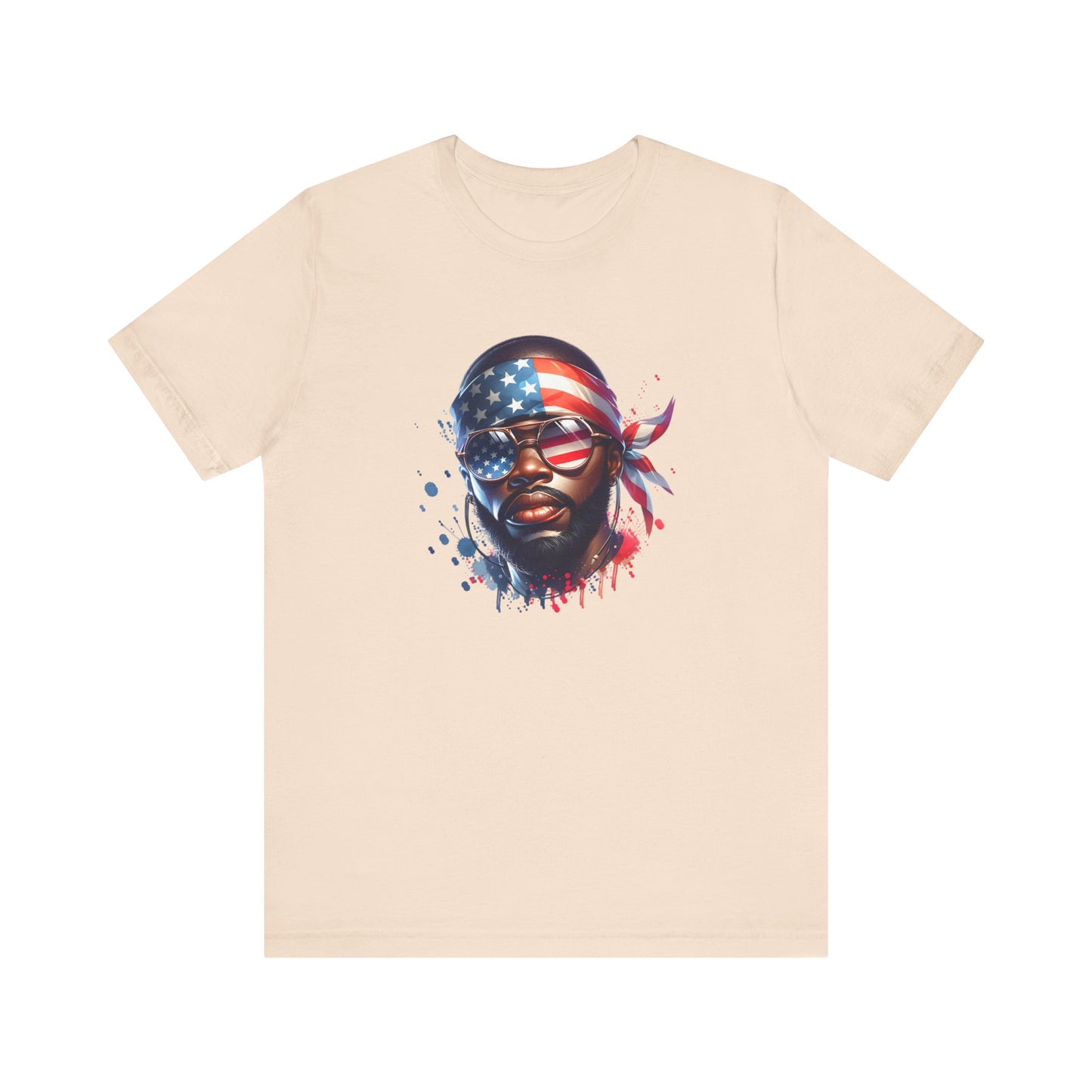 Cream t-shirt with a graphic of a face wearing an American flag bandana on a white background