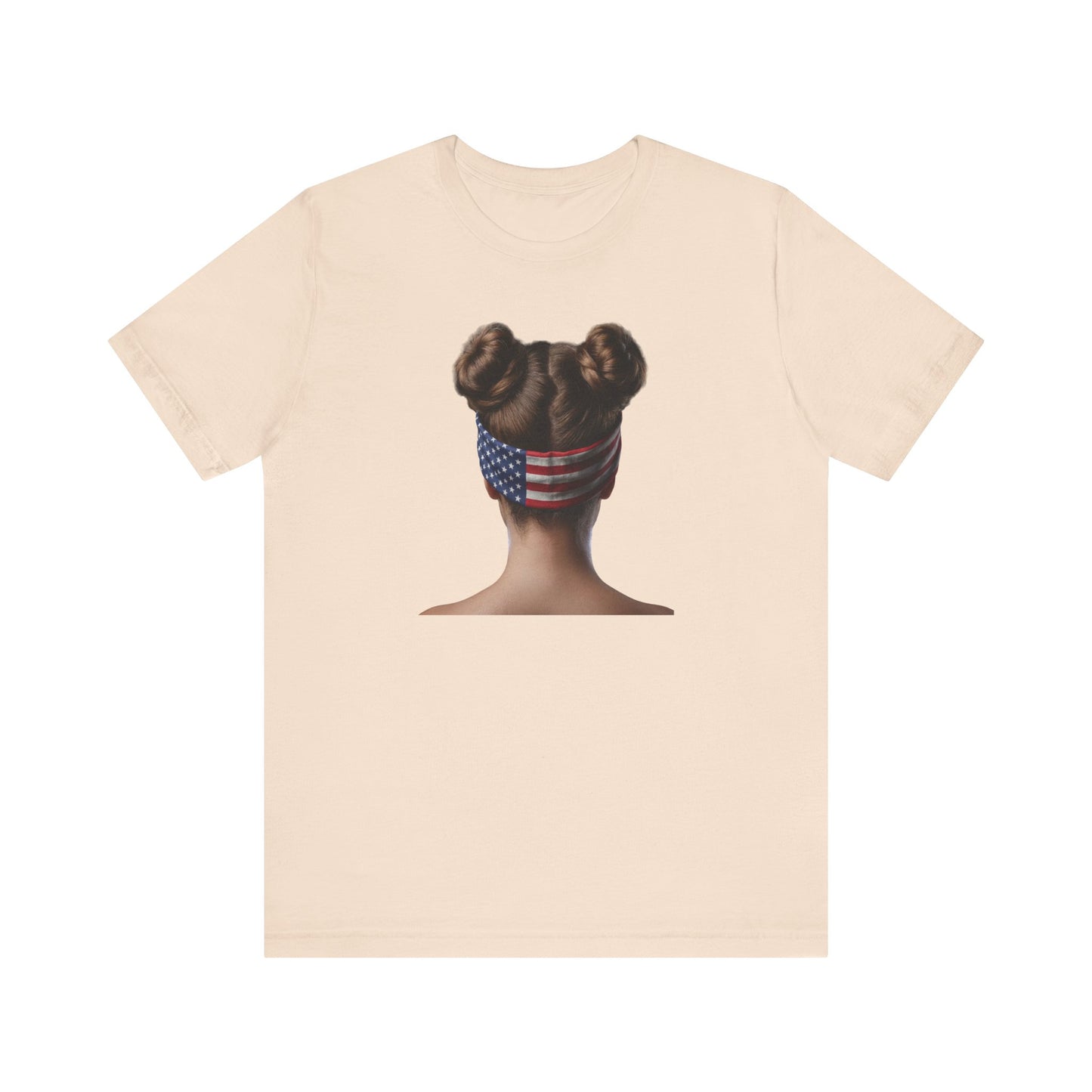 Soft cream t-shirt with a graphic of a person with braided hair wearing an American flag headband on the back.