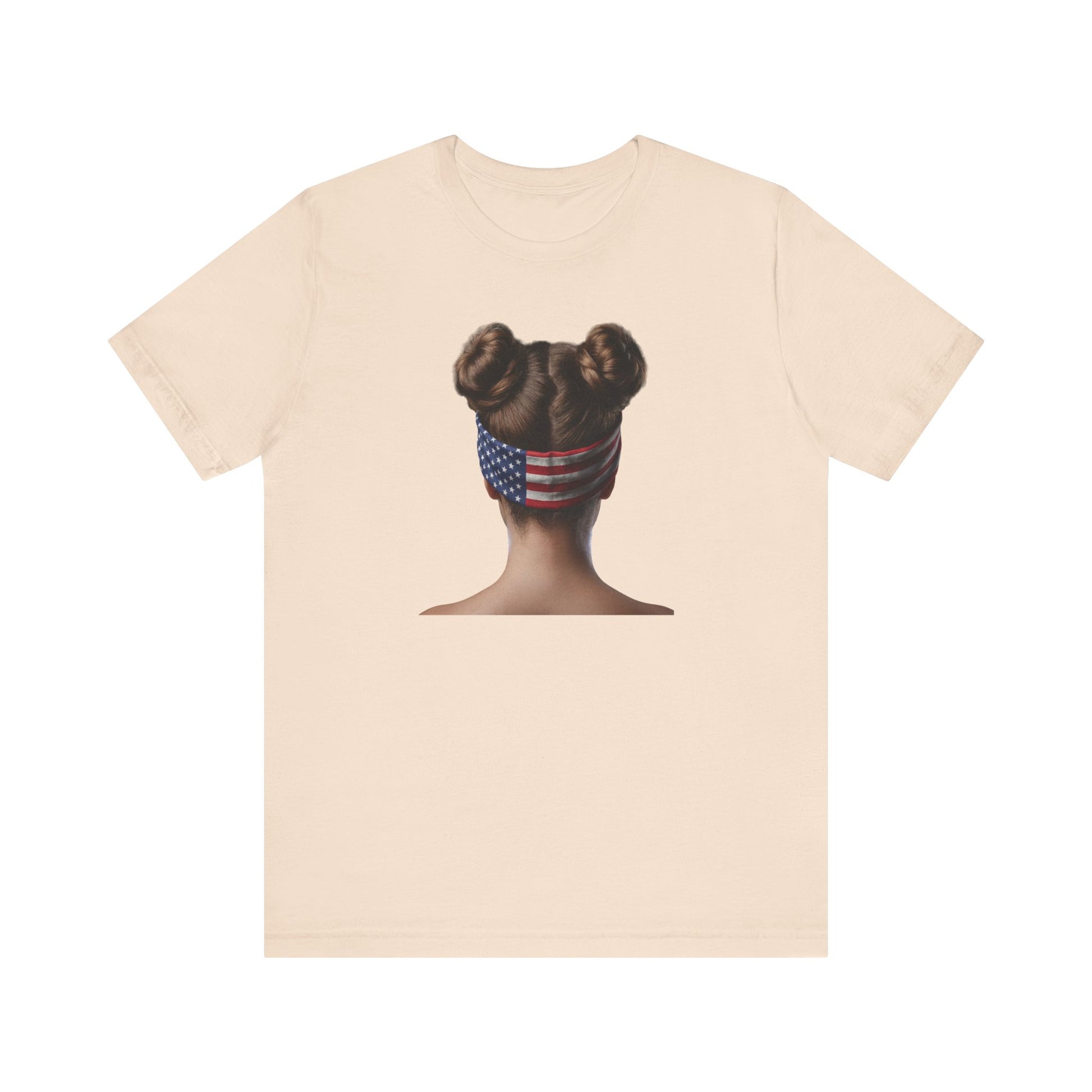 Soft cream t-shirt with a graphic of a person with braided hair wearing an American flag headband on the back.