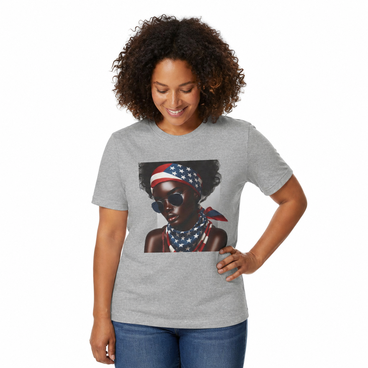 Woman wearing a gray t-shirt with a graphic of a woman with a bandana on a white background