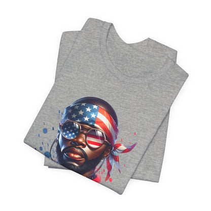 Heather navy t-shirt folded with a graphic of a face wearing an American flag bandana on a white background