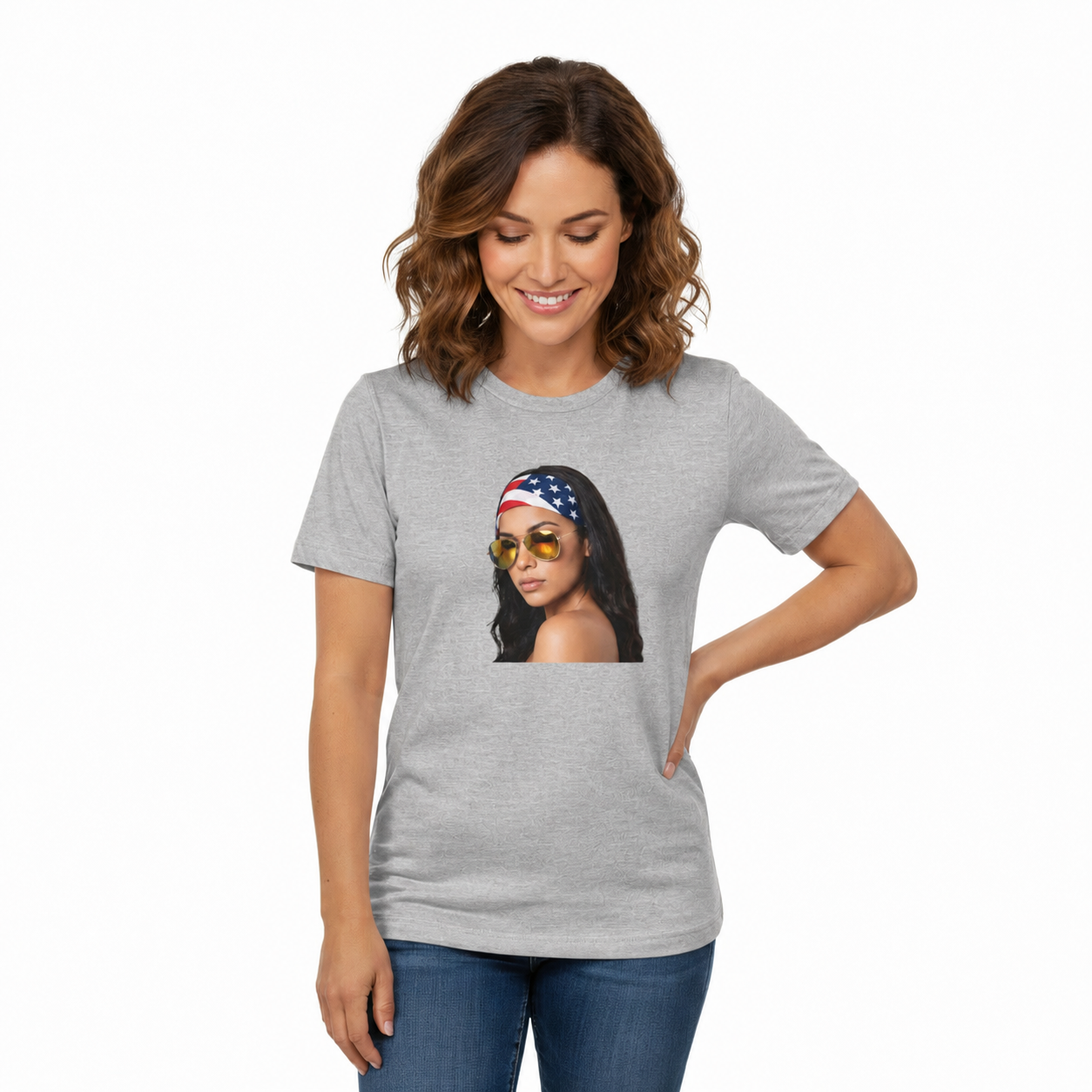 Woman wearing a heather gray t-shirt with a graphic of a woman with sunglasses and an American flag headband.