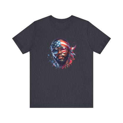 Heather navy t-shirt with a graphic of a face wearing an American flag bandana on a white background