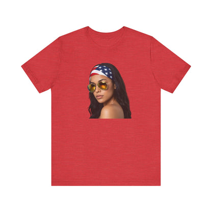 Heather red t-shirt with a graphic of a woman wearing sunglasses and an American flag headband on a white background.